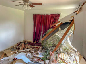 A truck jumped the ditch and drove through the home. Lucky nobody was home at the time of crash.
