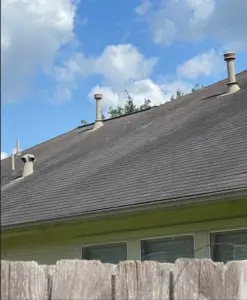 Damaged shingles on home in the Villages of Cypress Lakes, 2023, from wind and hail.