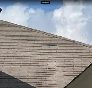 Damaged shingles on home in the Villages of Cypress Lakes, 2023, from wind and hail.