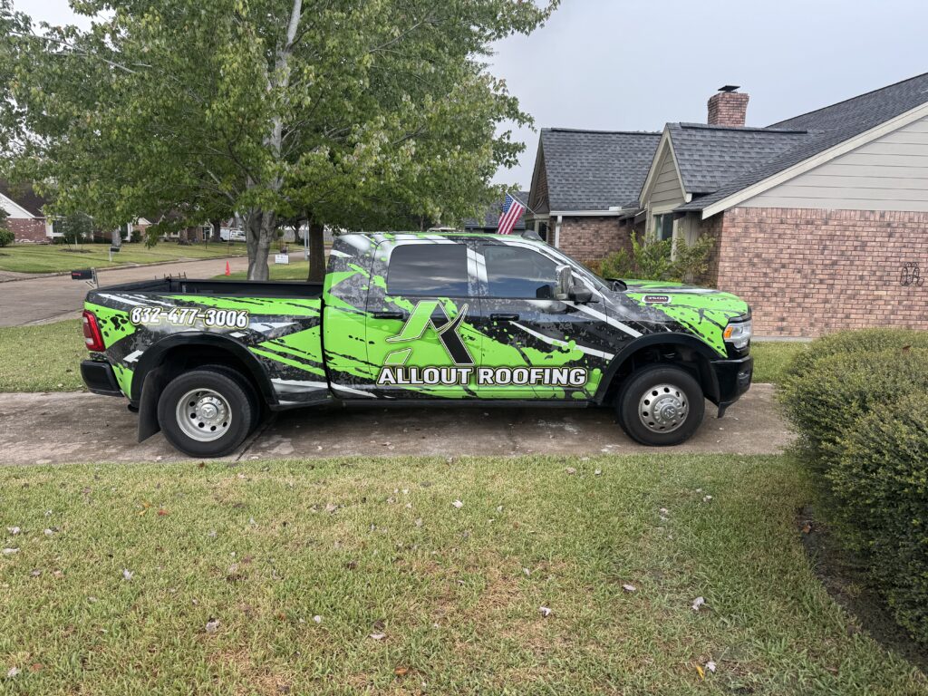 All Out Roofing Truck on job site in Houston Texas.