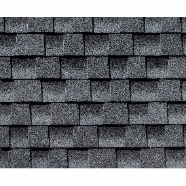 Architectural laminated shingle showing the layered shadow lines that separate it from 3-tab in the asphalt vs architectural shingles decision