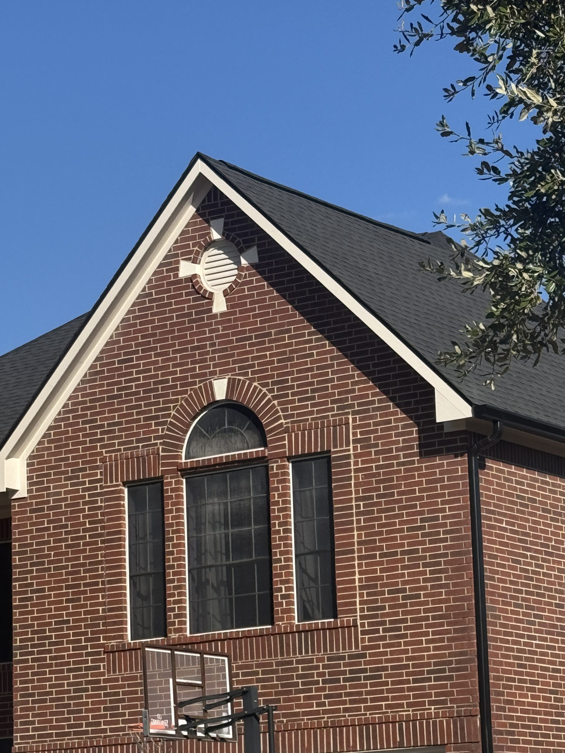 Completed roof replacement on a Katy brick home finished in a single day