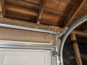 Attic radiant barrier and decking photographed on a Katy-area roofing job